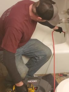 plumber plumbing Clogged tub drain